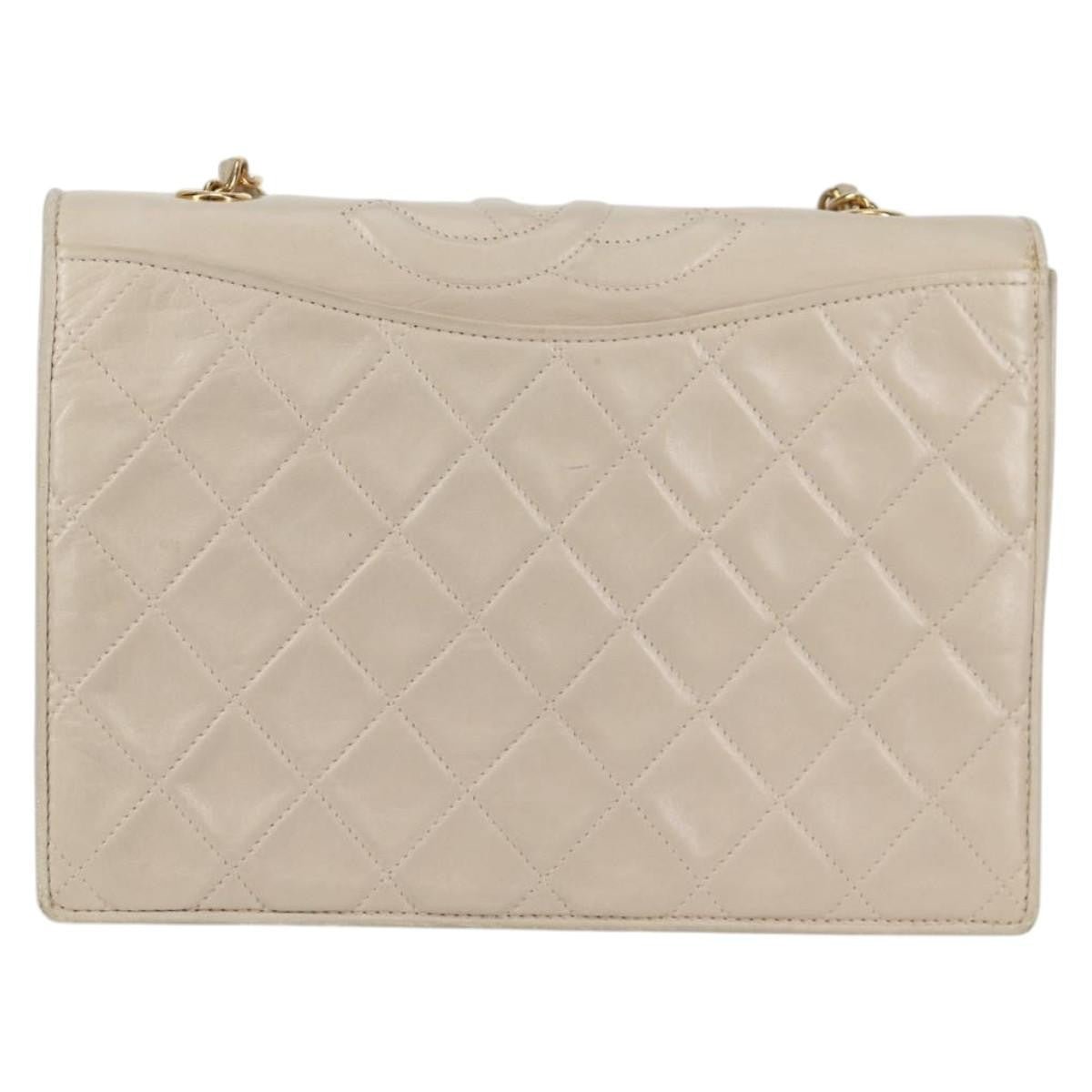 Chanel Vintage Mini Flap Bag con Nappina in Agnello Trapuntato – Oro - Etoilux