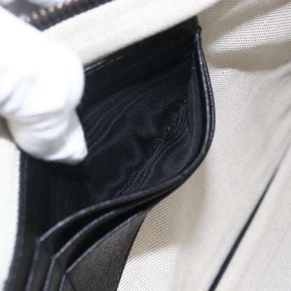 Gucci GG Marmont Pouch Pelle nera con logo GG – Pochette iconica - Etoilux