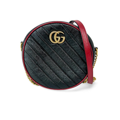 Gucci GG Marmont Mini Round – Pelle matelassé nera e rossa