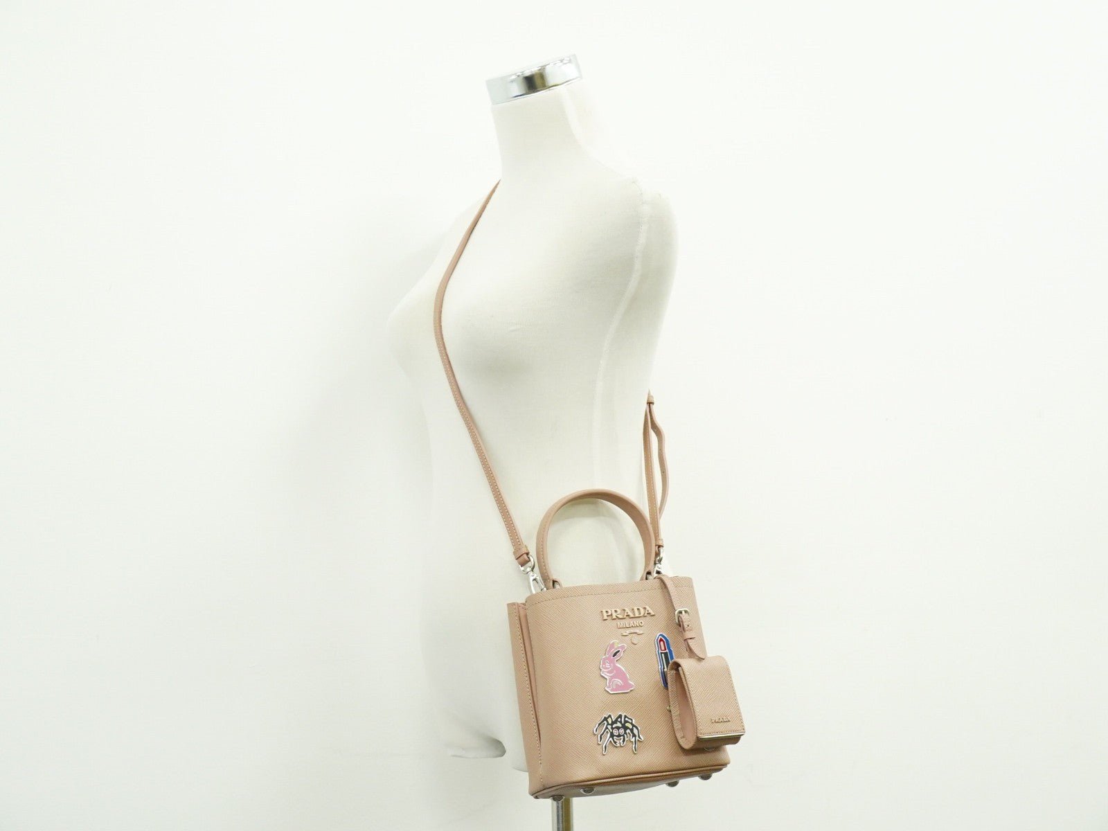 Prada Panier Bucket Bag in Saffiano Leather Beige – Limited Edition Pins - Etoilux