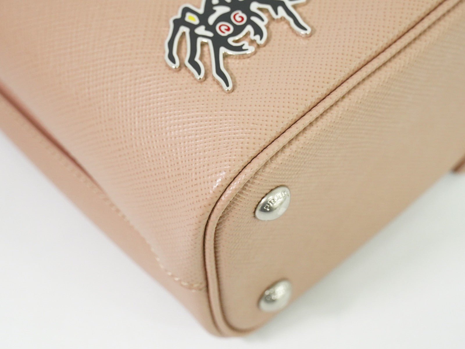 Prada Panier Bucket Bag in Saffiano Leather Beige – Limited Edition Pins - Etoilux