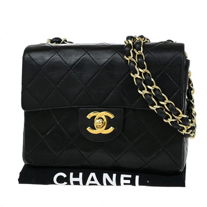 Chanel Vintage Mini Classic Flap Agnello Nero Hardware Oro – 17 cm - Etoilux
