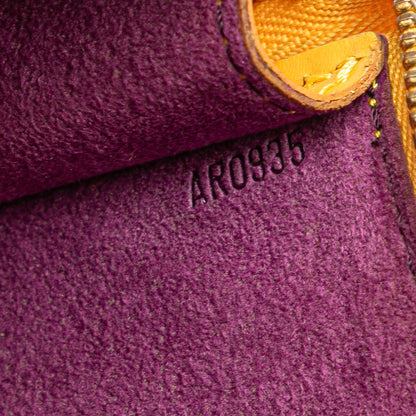 Louis Vuitton Pochette Accessoires Pelle Epi Giallo Tassil 1995 – Made in France - Etoilux