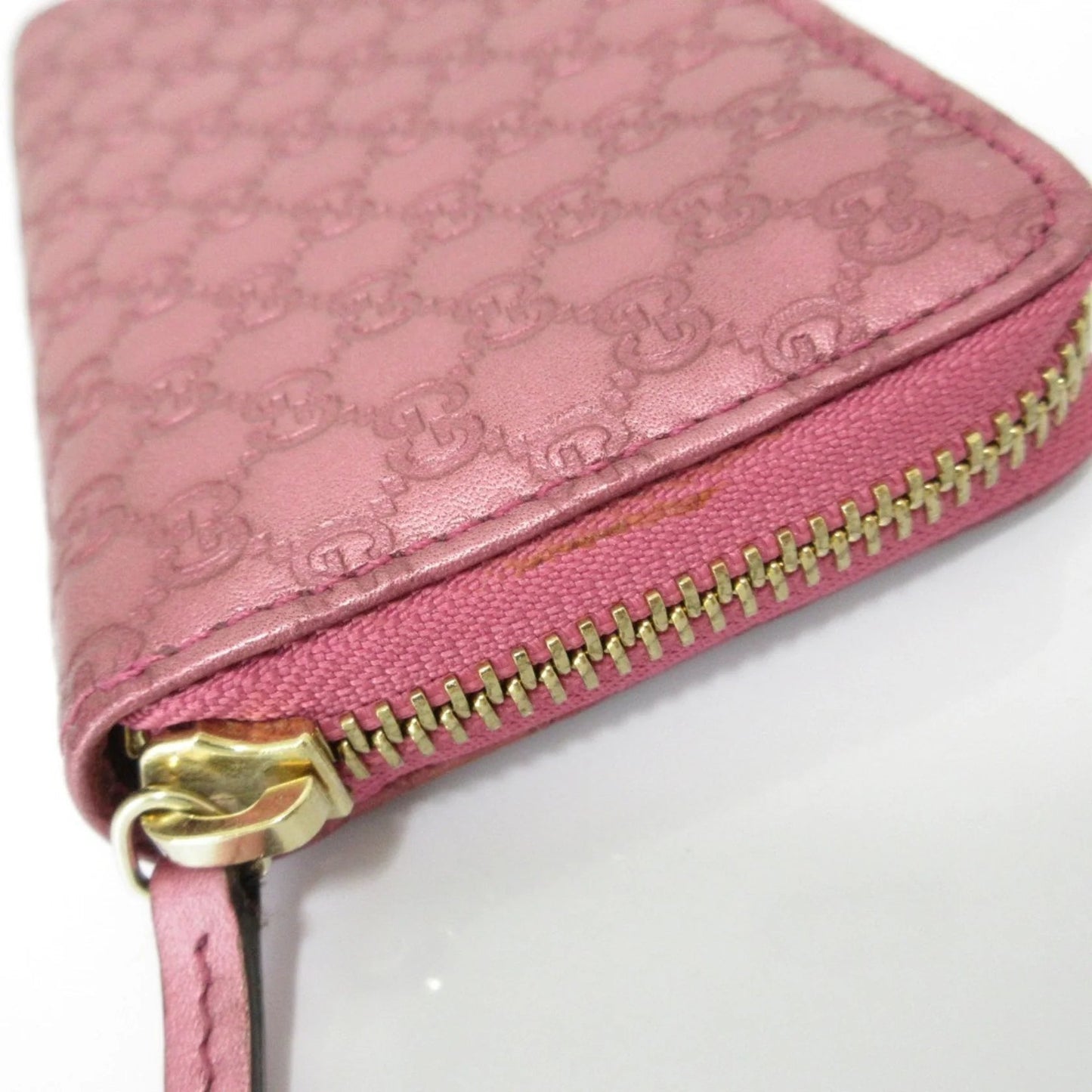 Gucci Portafoglio/portamonete in pelle Microsima con cerniera rotonda GUCCI, rosa metallizzato da donna - Etoilux