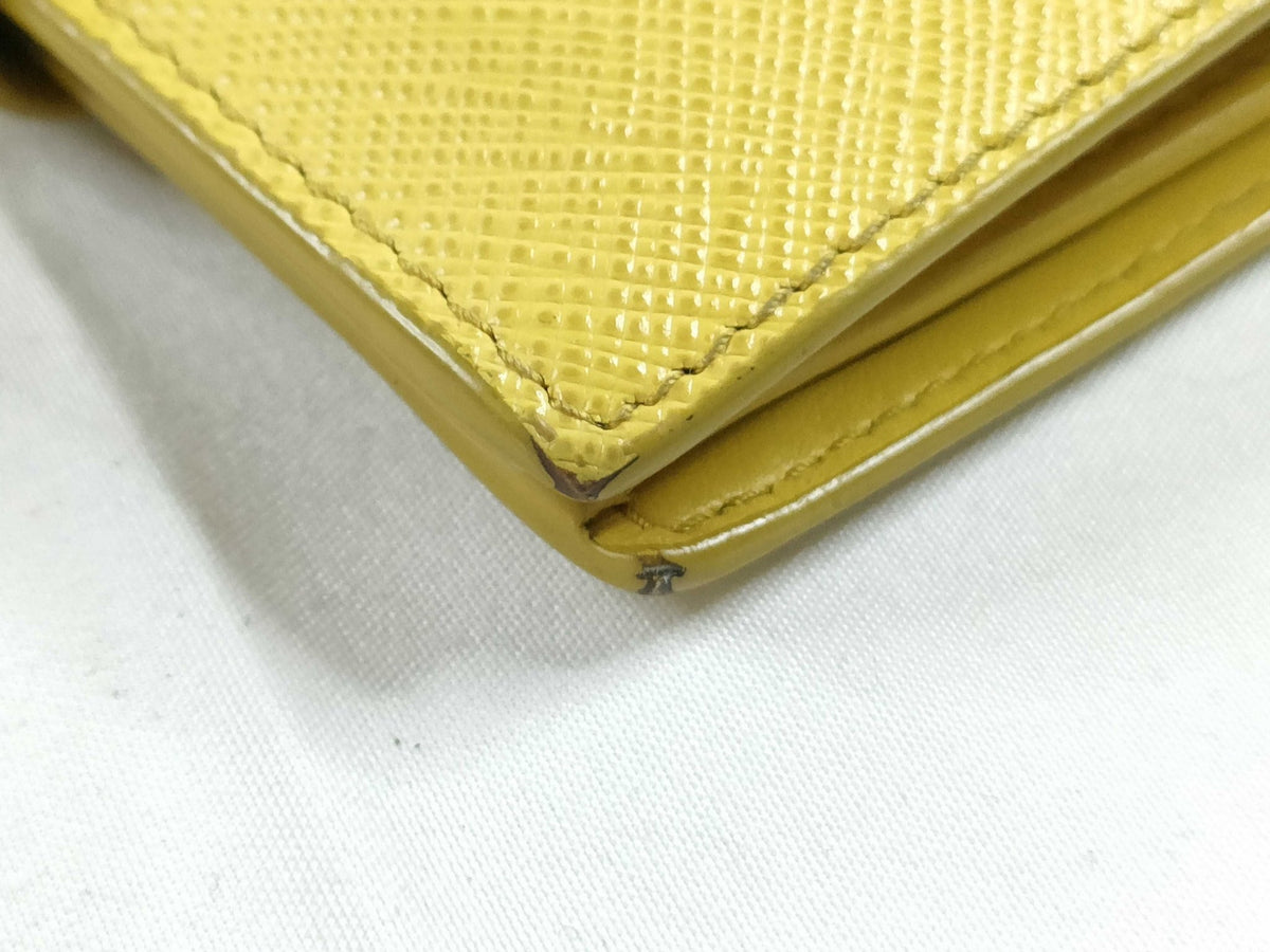 Prada Saffiano – angoli con lieve usura - Etoilux