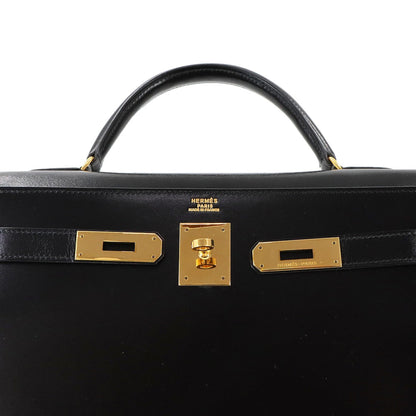 Hermès Kelly 32 in Pelle Nera – Oro - Etoilux