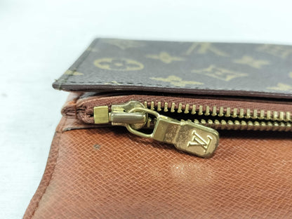 Louis Vuitton Porte Trésor International - Etoilux