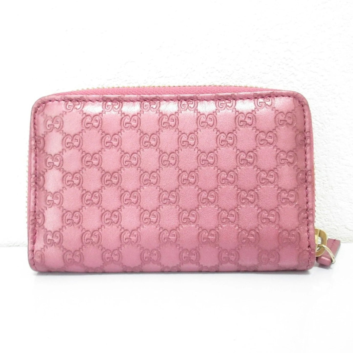 Portafoglio Gucci rosa ziparound in pelle Microguccissima