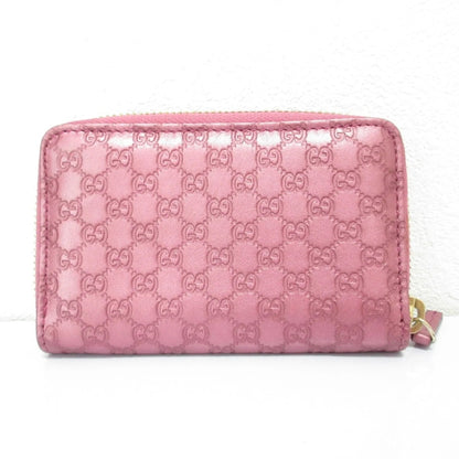 Portafoglio Gucci rosa ziparound in pelle Microguccissima