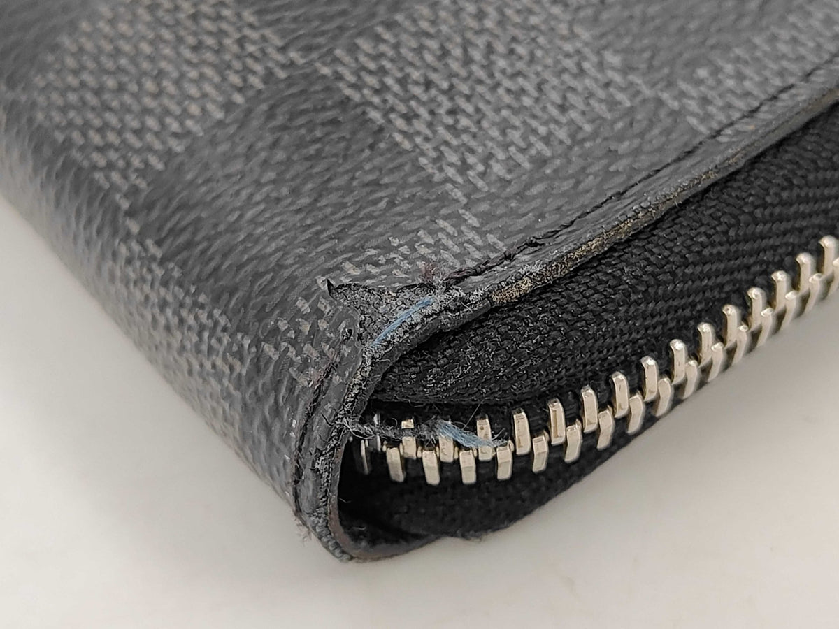 Louis Vuitton Zippy Verticale - Etoilux