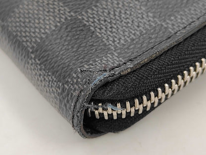 Louis Vuitton Zippy Verticale - Etoilux