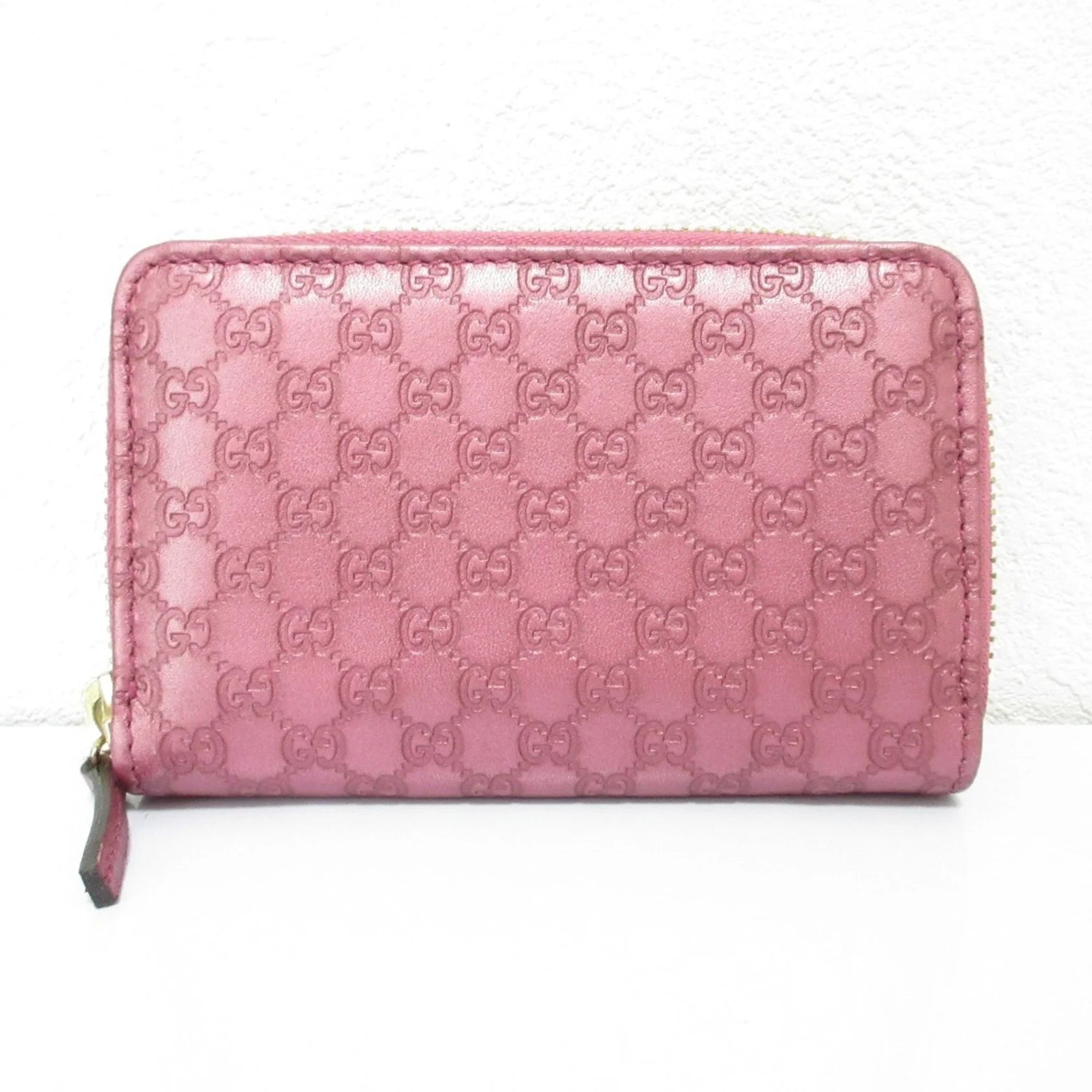 Gucci Portafoglio/portamonete in pelle Microsima con cerniera rotonda GUCCI, rosa metallizzato da donna - Etoilux
