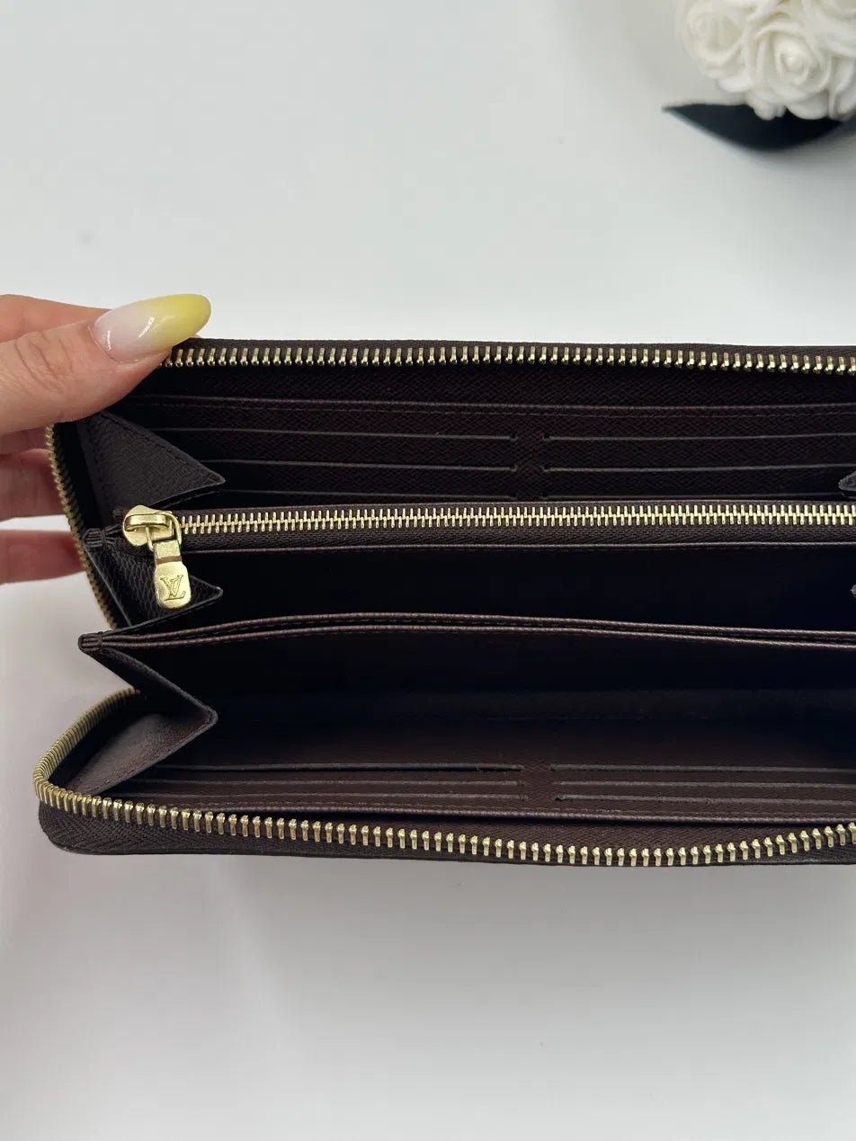 Louis Vuitton Portafoglio Zippy NM Damier Ebène 2023 - Etoilux