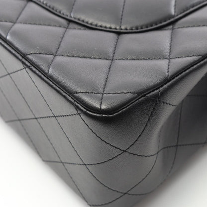 Chanel Timeless Classic Flap Medium – Pelle Nera con Hardware Argentato - Etoilux