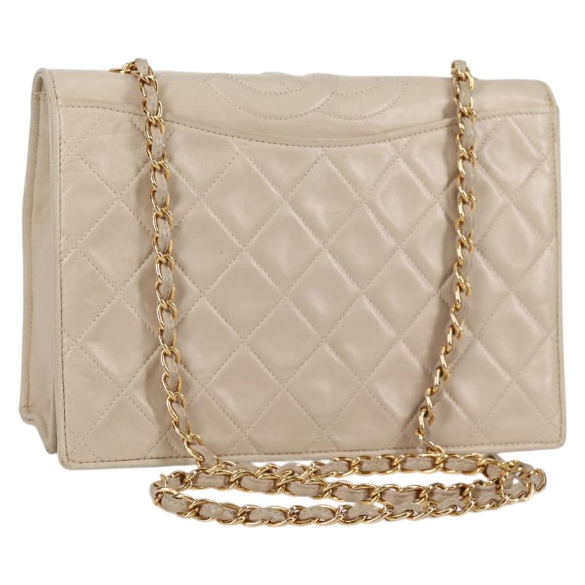 Chanel Vintage Mini Flap Bag con Nappina in Agnello Trapuntato – Oro - Etoilux
