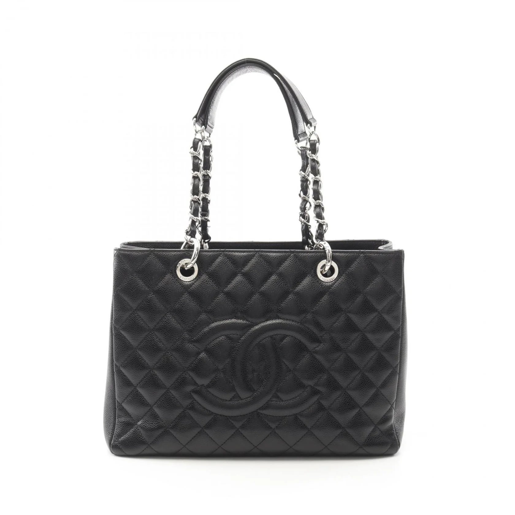 Chanel Grand Shopping Tote nera in pelle Caviar con catena argento e logo CC frontale.