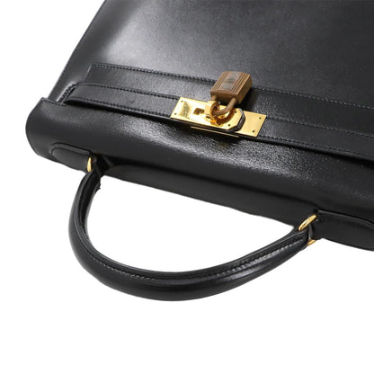 Hermès Kelly 32 in Pelle Nera – Oro - Etoilux