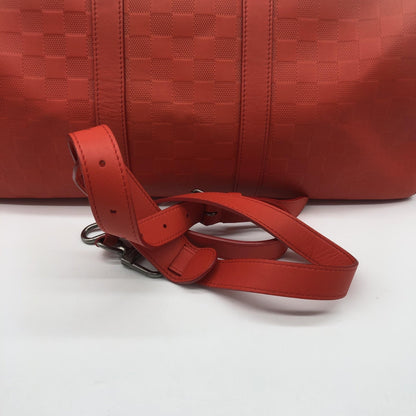 Louis Vuitton Keepall Bandoulière 55 Damier Infini Rosso Corallo, 2012 – 55 cm - Etoilux