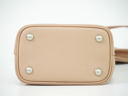 Prada Panier Bucket Bag in Saffiano Leather Beige – Limited Edition Pins - Etoilux