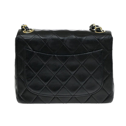 Chanel Vintage Mini Classic Flap Agnello Nero Hardware Oro – 17 cm - Etoilux