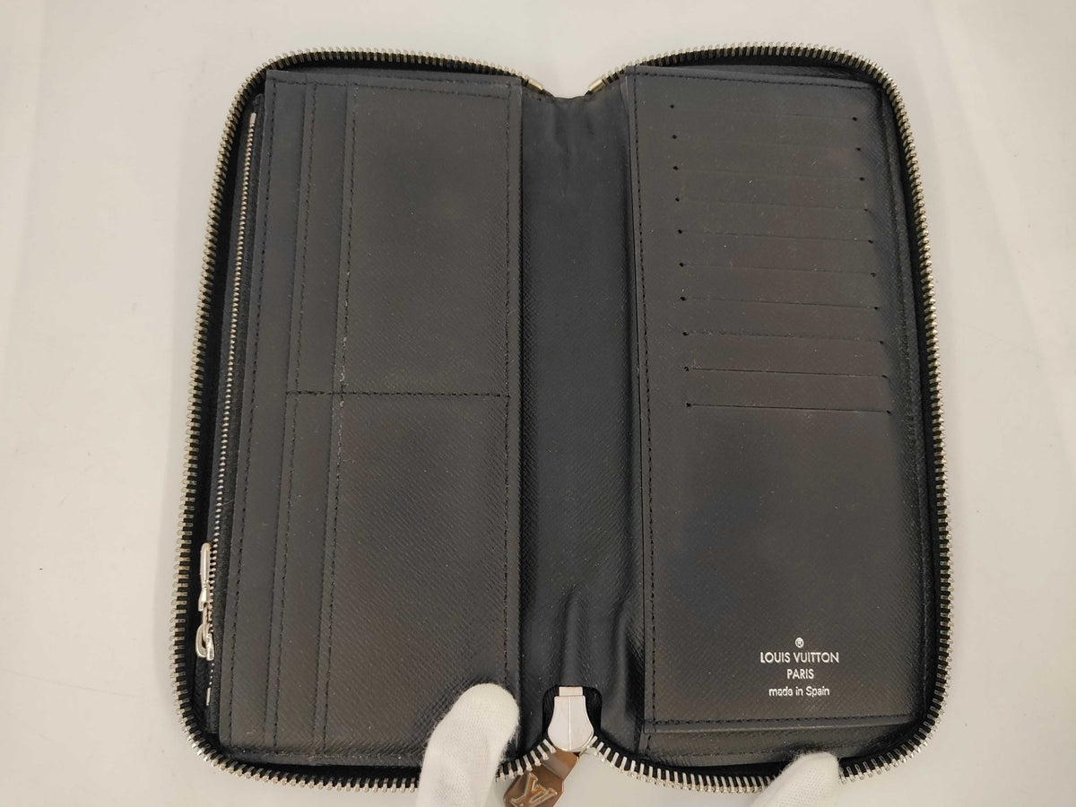 Louis Vuitton Zippy Verticale - Etoilux