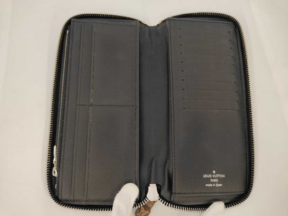 Louis Vuitton Zippy Verticale - Etoilux