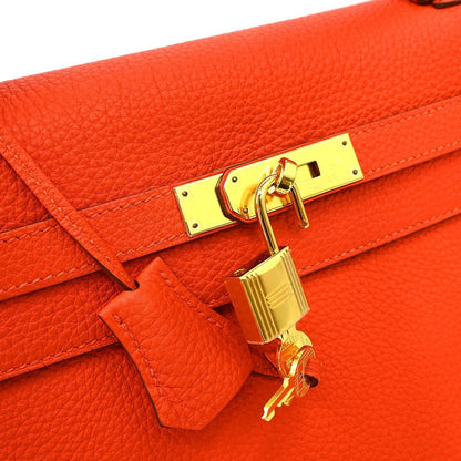 Hermès Kelly 32 – Leather Orange – AB (Very Good Condition) - Etoilux
