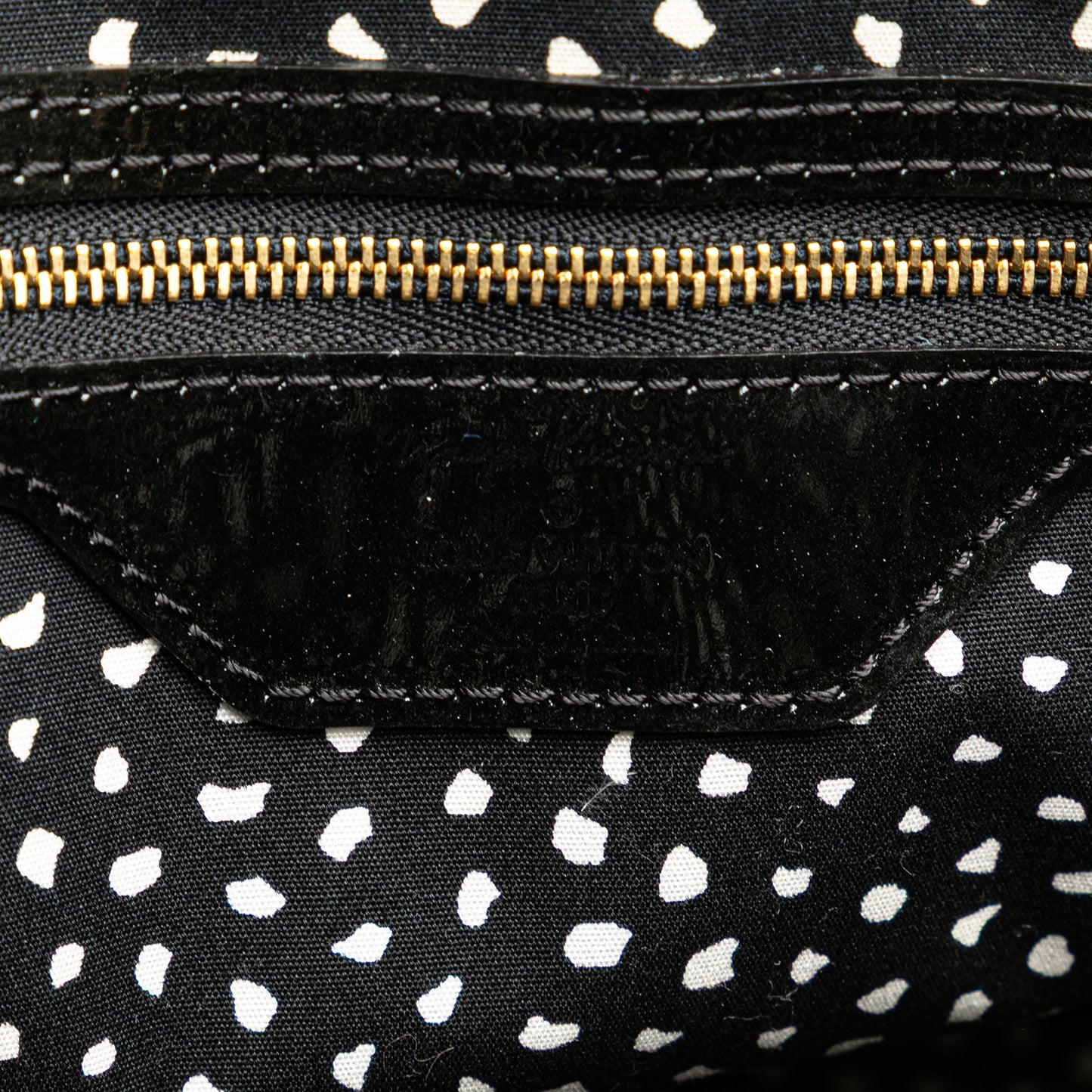Louis Vuitton – Yayoi Kusama Monogram Infinity Dots Lockit MM (2012)