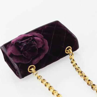 Chanel Camellia Quilted Velvet Mini Flap Bag Viola Prugna Hardware Oro – 15 cm
