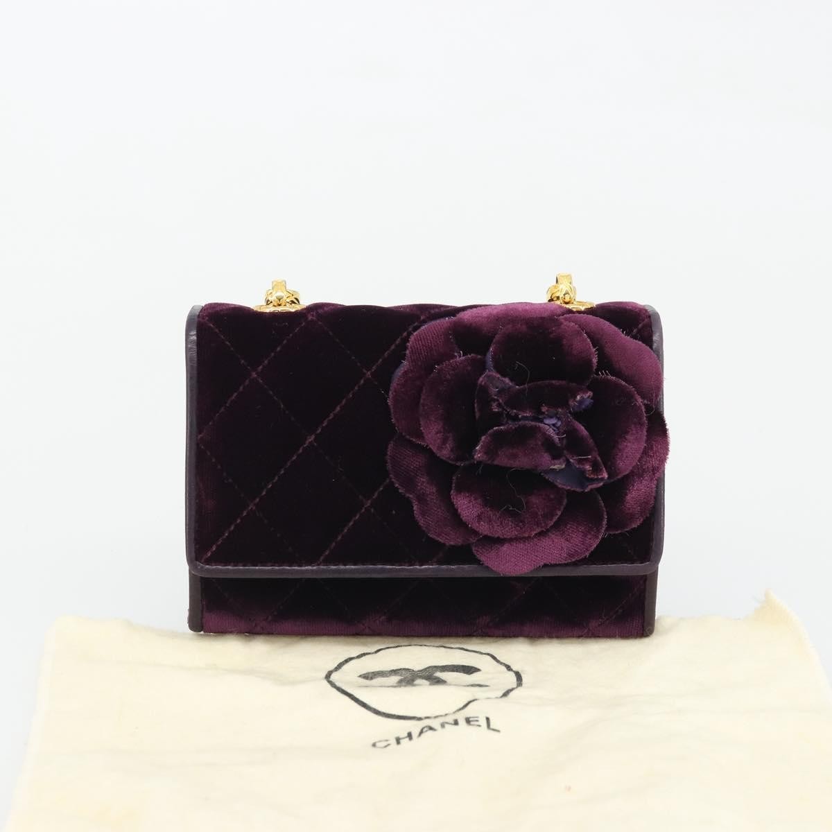 Chanel Camellia Quilted Velvet Mini Flap Bag Viola Prugna Hardware Oro – 15 cm
