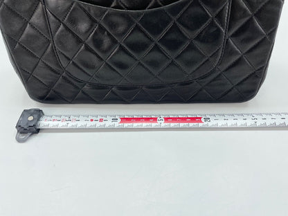 Chanel Matelassé Flap con catena